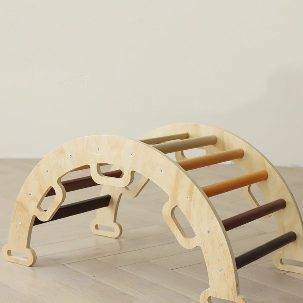 Montessori climbing triangle set with earth-tone rungs and wooden arch in natural colors