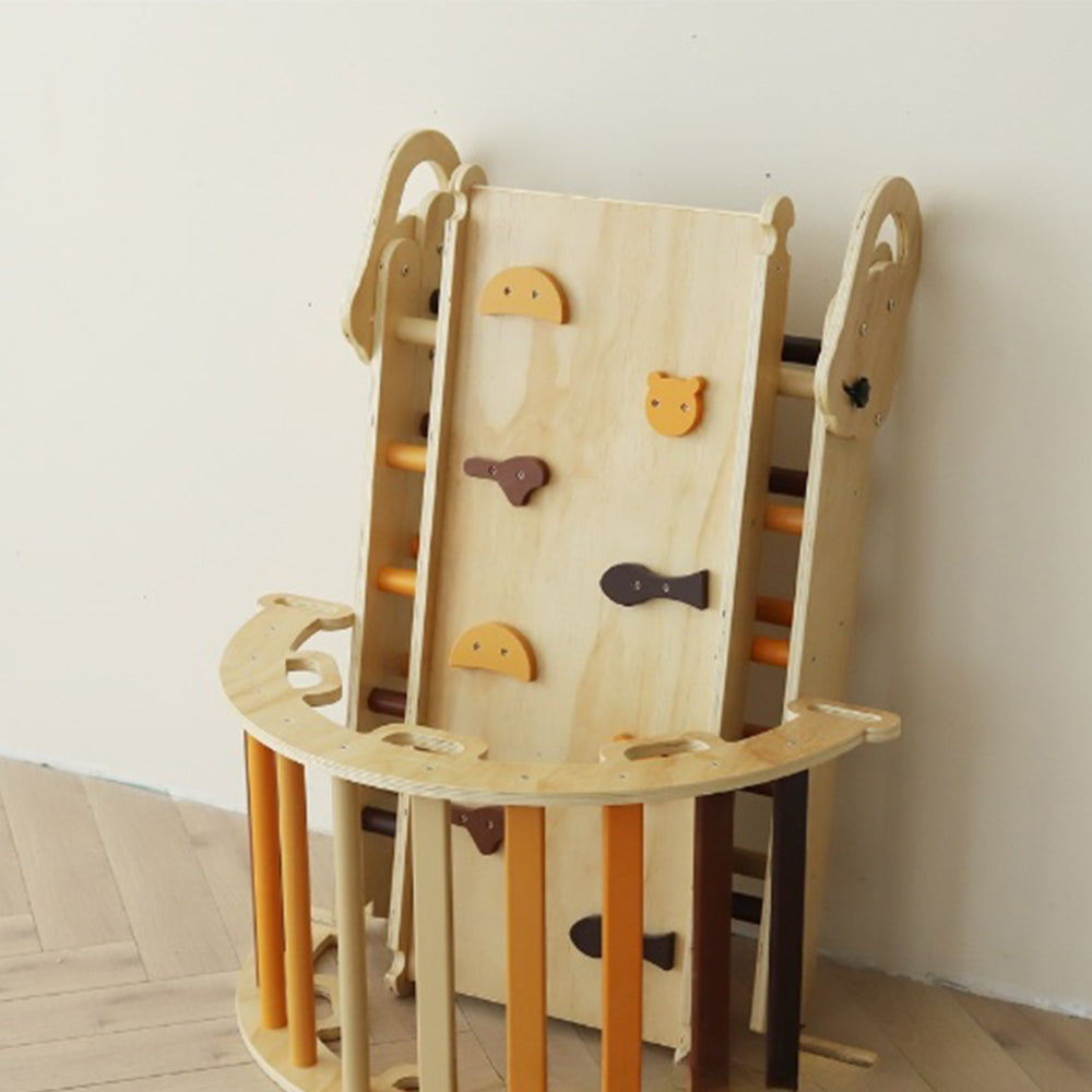 Montessori climbing triangle set with earth-tone rungs and wooden arch in natural colors