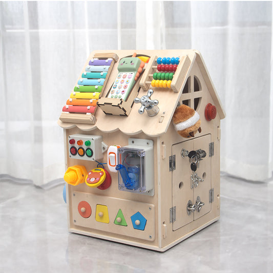 Wooden Montessori busy house with xylophone and sensory panels