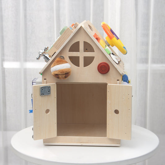 Busy board house with open door showing inner toy storage